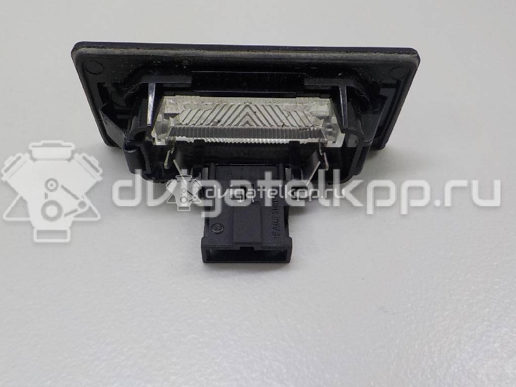 Фото Фонарь подсветки номера  8T0943021 для vw Passat [B6] {forloop.counter}}