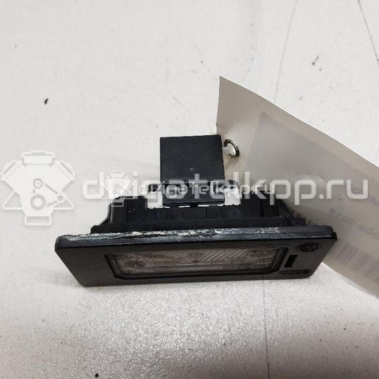 Фото Фонарь подсветки номера  8T0943021 для vw Passat [B6]