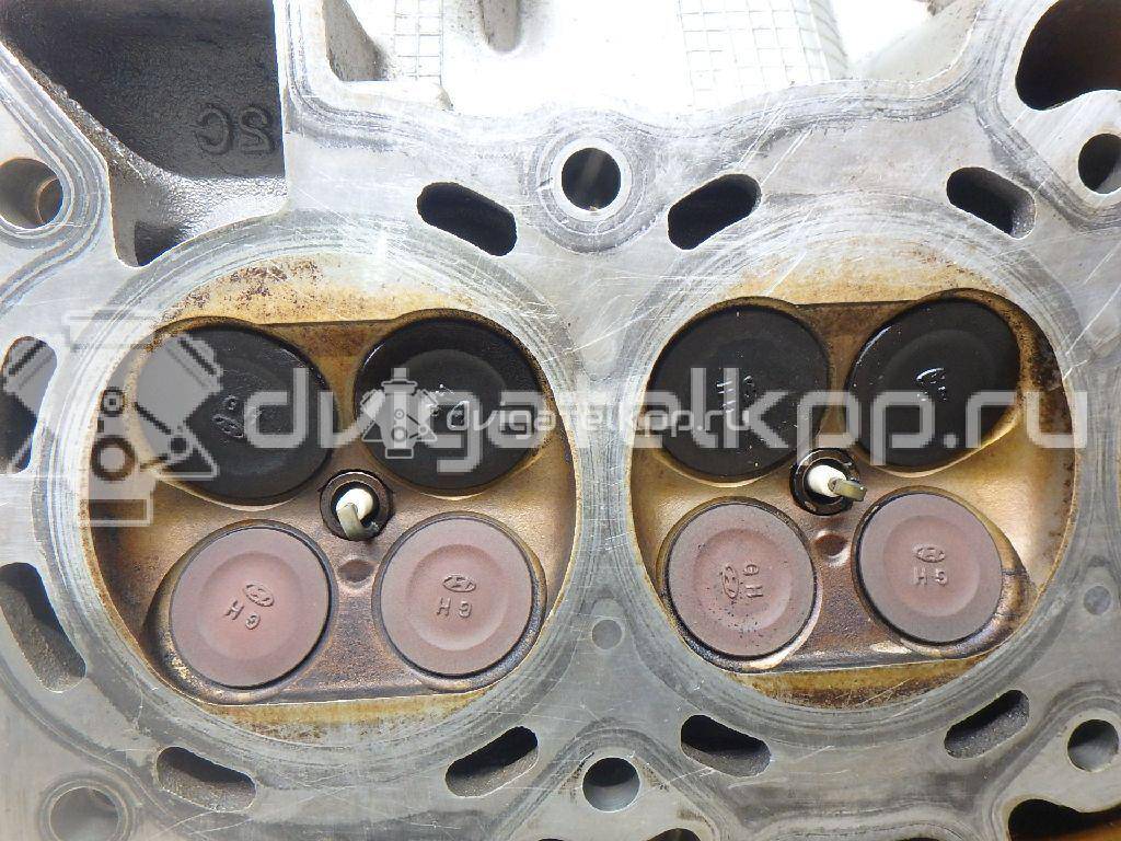 Фото Головка блока для двигателя G4FC для Hyundai / Kia 105-132 л.с 16V 1.6 л бензин 221002B002 {forloop.counter}}