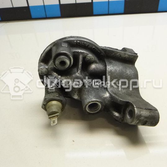 Фото Кронштейн масляного фильтра для двигателя ADZ для Volkswagen Passat / Polo / Derby / Golf 90 л.с 8V 1.8 л бензин 053115417A