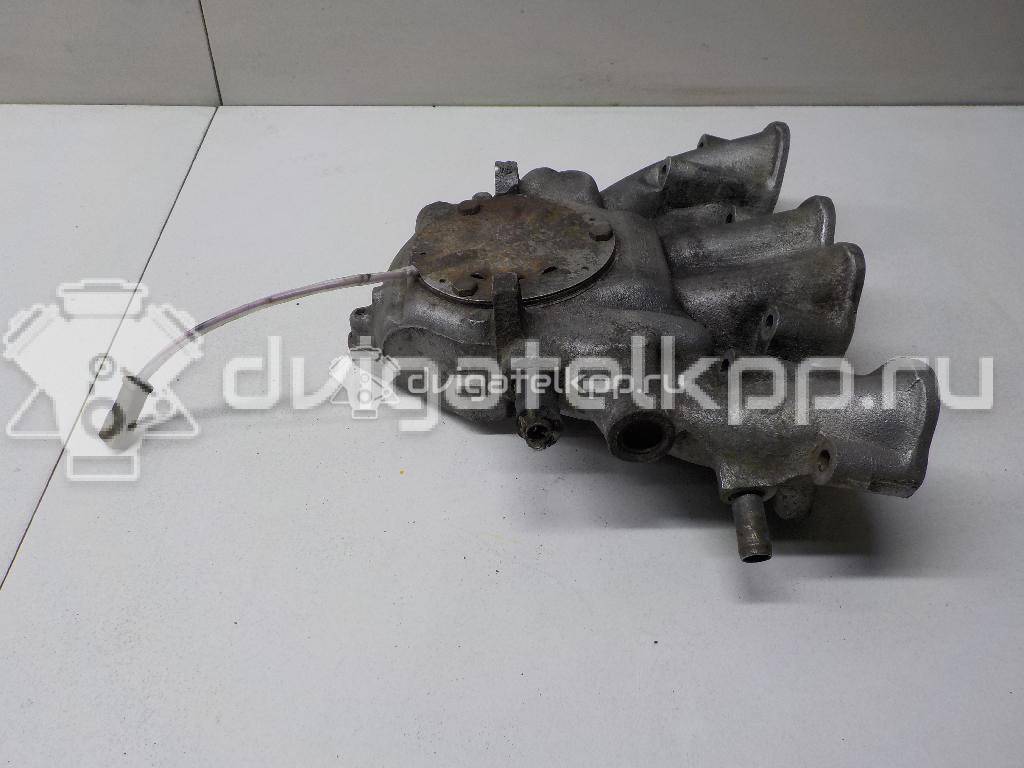 Фото Коллектор впускной для двигателя ABS для Volkswagen Derby 90 л.с 8V 1.8 л бензин 051129713 {forloop.counter}}