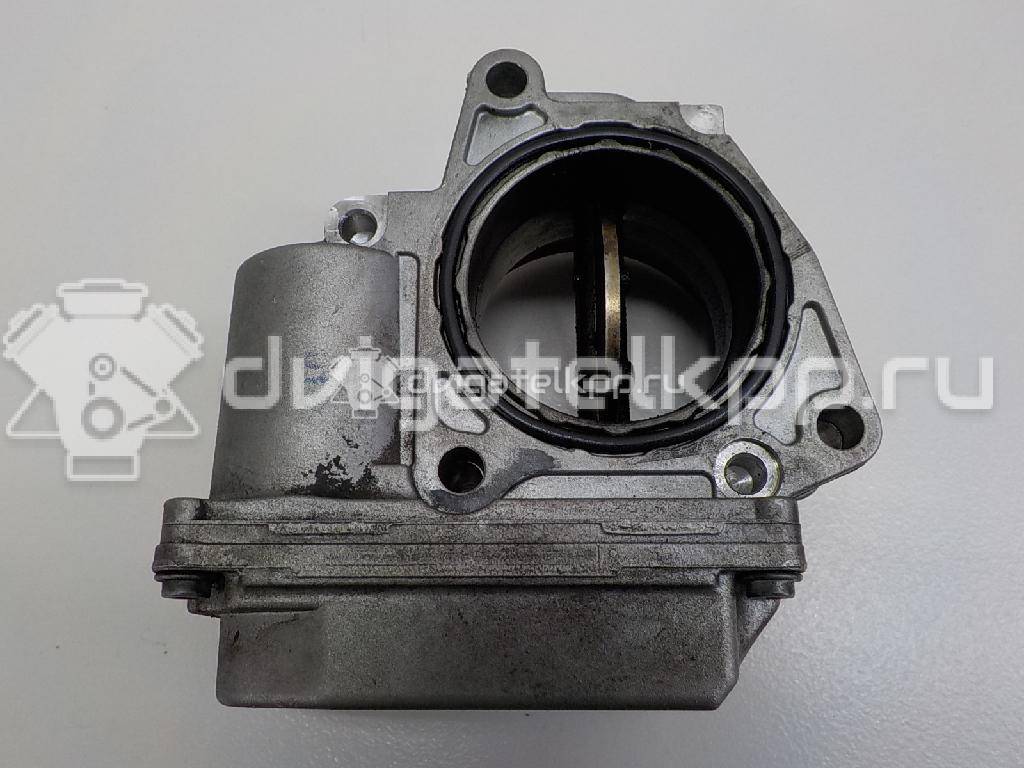 Фото Заслонка дроссельная электрическая  03G128063L для dodge Caliber {forloop.counter}}