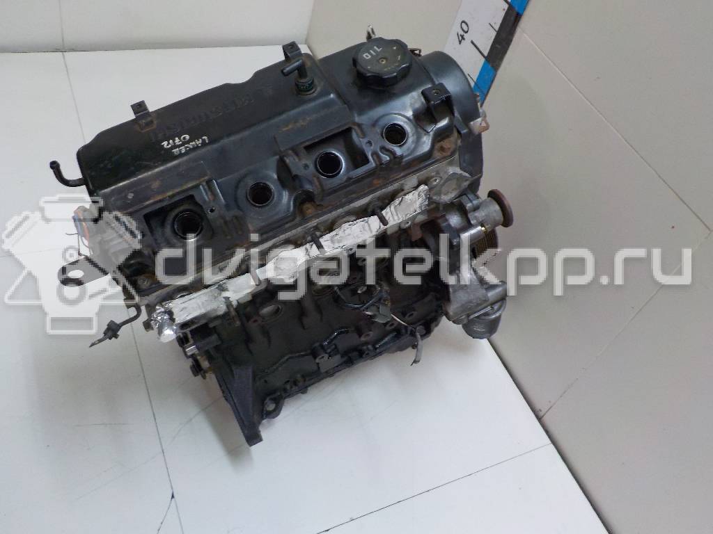 Фото Контрактный (б/у) двигатель 4G13 (12V) для Mitsubishi Colt / Mirage / Lancer 60-79 л.с 12V 1.3 л бензин {forloop.counter}}