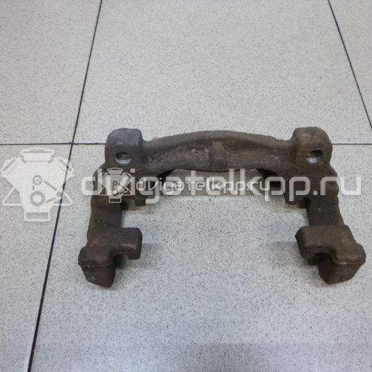 Фото Скоба суппорта переднего  1432360 для land rover Freelander 2