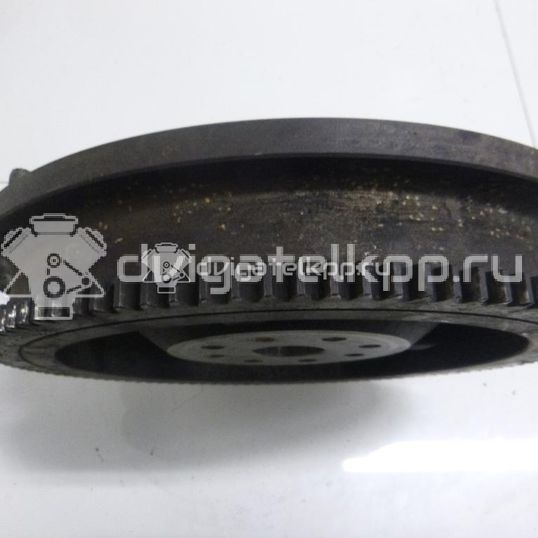 Фото Маховик для двигателя J20A для Maruti Suzuki / Suzuki / Chevrolet / Geo / Maruti 120-129 л.с 16V 2.0 л бензин 1262077EA0