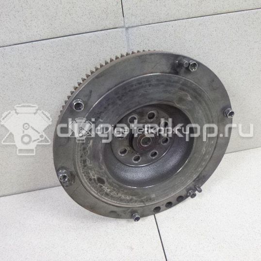 Фото Маховик для двигателя J20A для Maruti Suzuki / Suzuki / Chevrolet / Geo / Maruti 122 л.с 16V 2.0 л бензин 1262077EA0