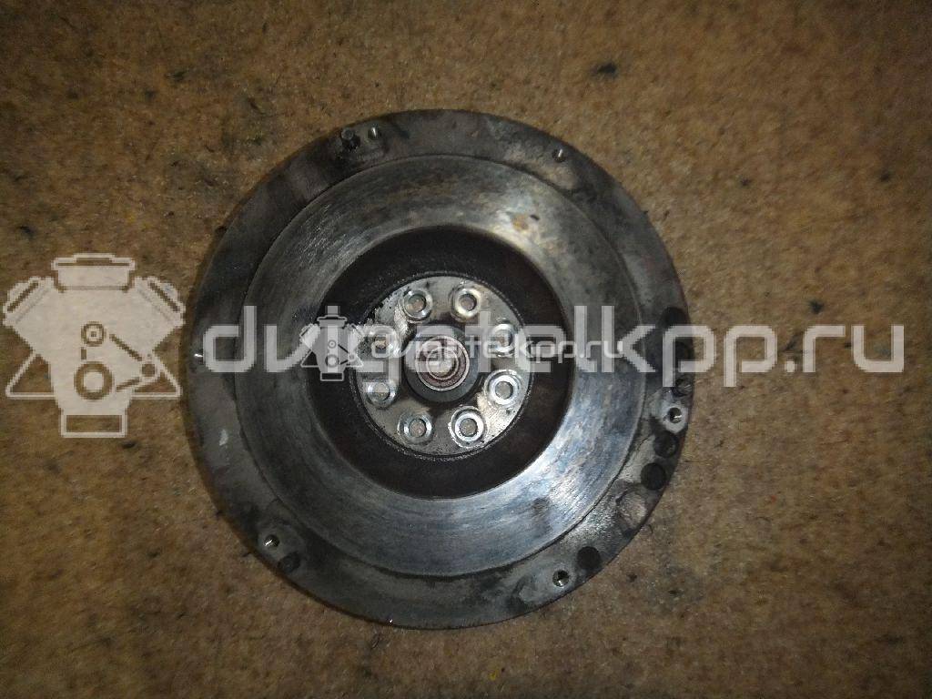 Фото Маховик для двигателя J20A для Maruti Suzuki / Suzuki / Chevrolet / Geo / Maruti 120-129 л.с 16V 2.0 л бензин 1262077EA0 {forloop.counter}}