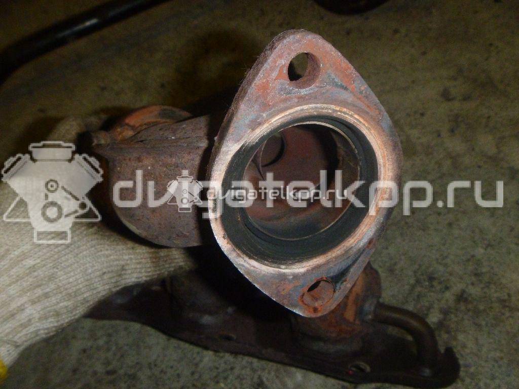 Фото Коллектор выпускной для двигателя J20A для Maruti Suzuki / Suzuki / Chevrolet / Geo / Maruti 128-132 л.с 16V 2.0 л бензин 1411065J00 {forloop.counter}}