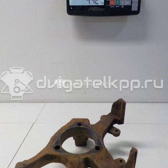 Фото Кулак поворотный передний правый  90498811 для Opel Astra / Zafira