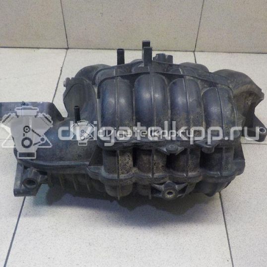 Фото Коллектор впускной для двигателя M13A для Suzuki / Chevrolet 82-94 л.с 16V 1.3 л бензин 1311086G00