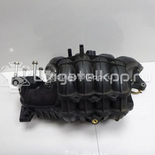 Фото Коллектор впускной для двигателя M13A для Suzuki / Chevrolet 82-94 л.с 16V 1.3 л бензин 1311086G00