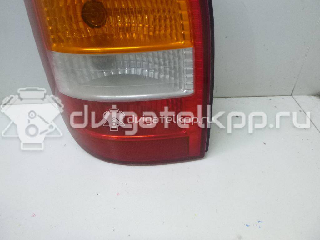 Фото Фонарь задний левый  6223027 для Opel Zafira {forloop.counter}}