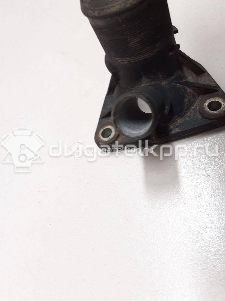 Фото Фланец двигателя системы охлаждения  1336C9 для Peugeot 406 / 309 / 605 6B / 806 221 / Expert {forloop.counter}}