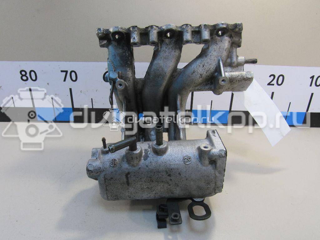 Фото Коллектор впускной для двигателя K6A для Suzuki / Mazda / Caterham / Nissan 82 л.с 12V 0.7 л бензин 1311076JA1 {forloop.counter}}