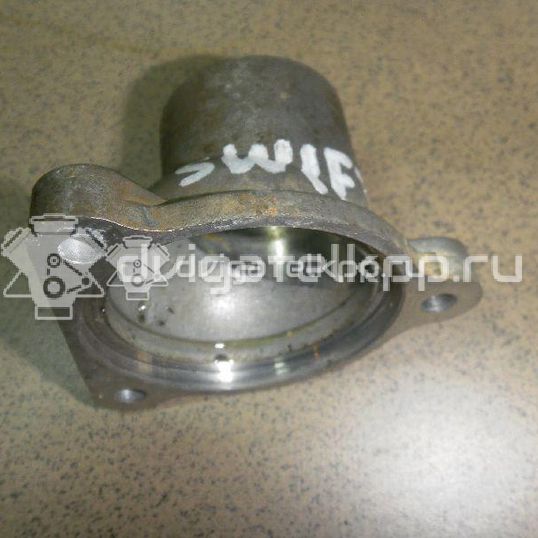 Фото Крышка термостата для двигателя M13A для Suzuki / Chevrolet 82-94 л.с 16V 1.3 л бензин 1756163J00