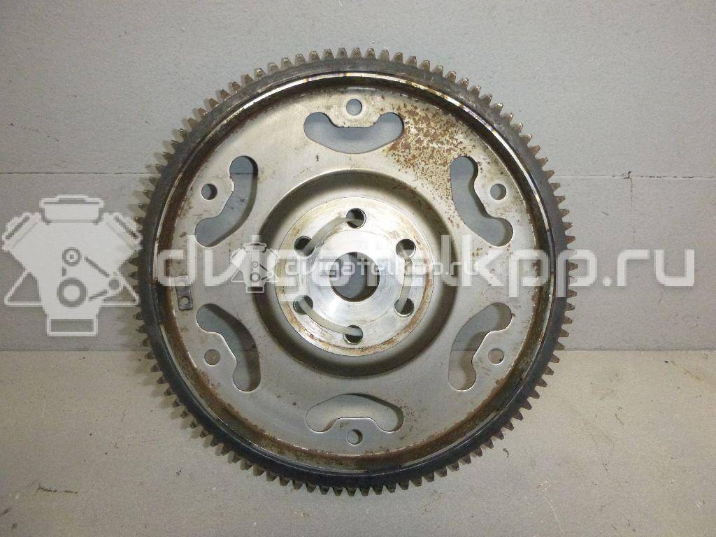 Фото Маховик для двигателя K12B для Suzuki / Mitsubishi / Vauxhall 86-94 л.с 16V 1.2 л бензин 2262073KR0 {forloop.counter}}