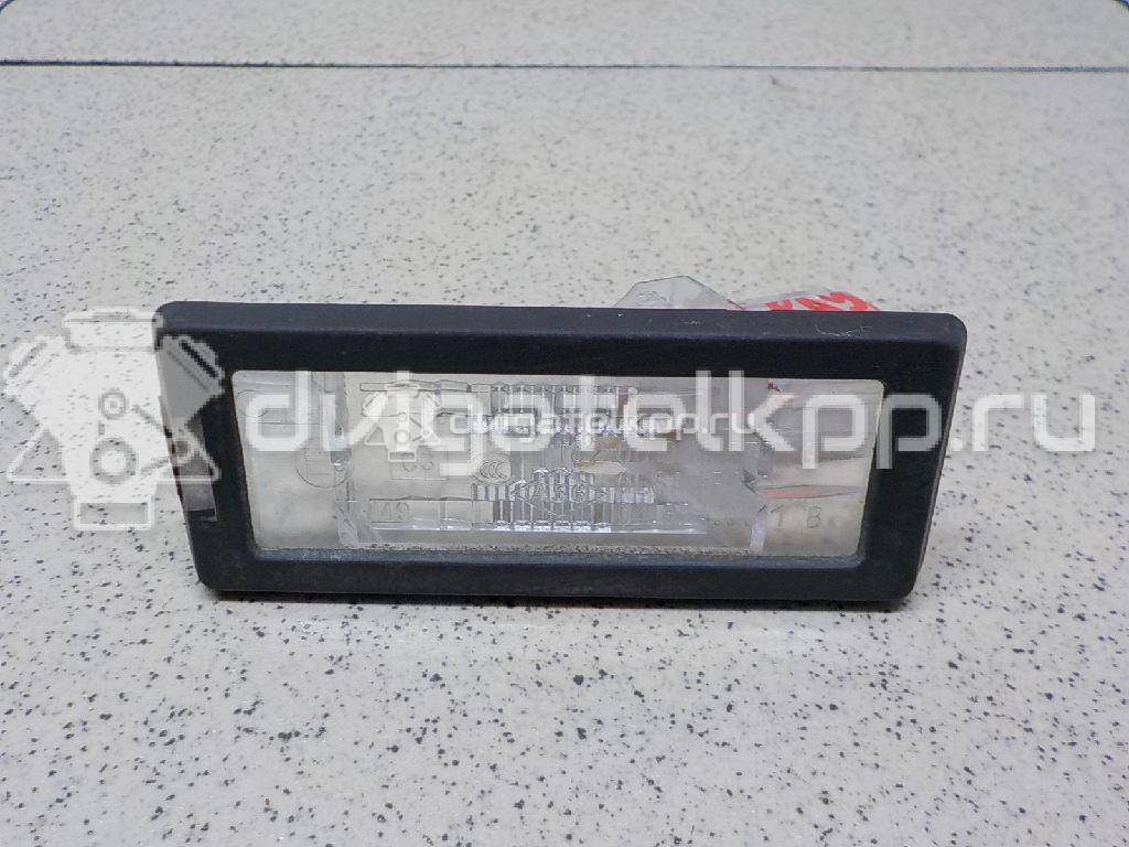 Фото Фонарь подсветки номера  8200013577 для Renault Modus Grand F Jp0 / Megane / Clio / Laguna / Scénic {forloop.counter}}