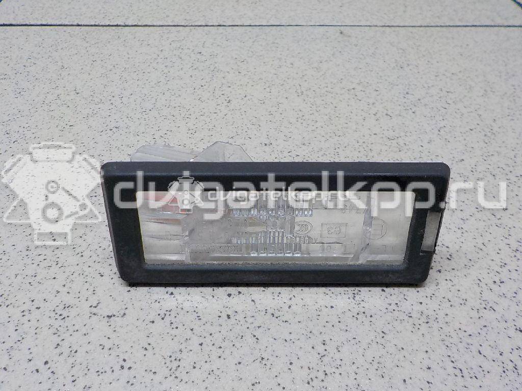 Фото Фонарь подсветки номера  8200013577 для Renault Modus Grand F Jp0 / Megane / Clio / Laguna / Scénic {forloop.counter}}