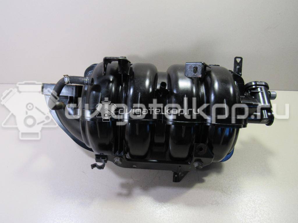 Фото Коллектор впускной для двигателя J20A для Maruti Suzuki / Suzuki / Chevrolet / Geo / Maruti 120-129 л.с 16V 2.0 л бензин 1311080J00 {forloop.counter}}