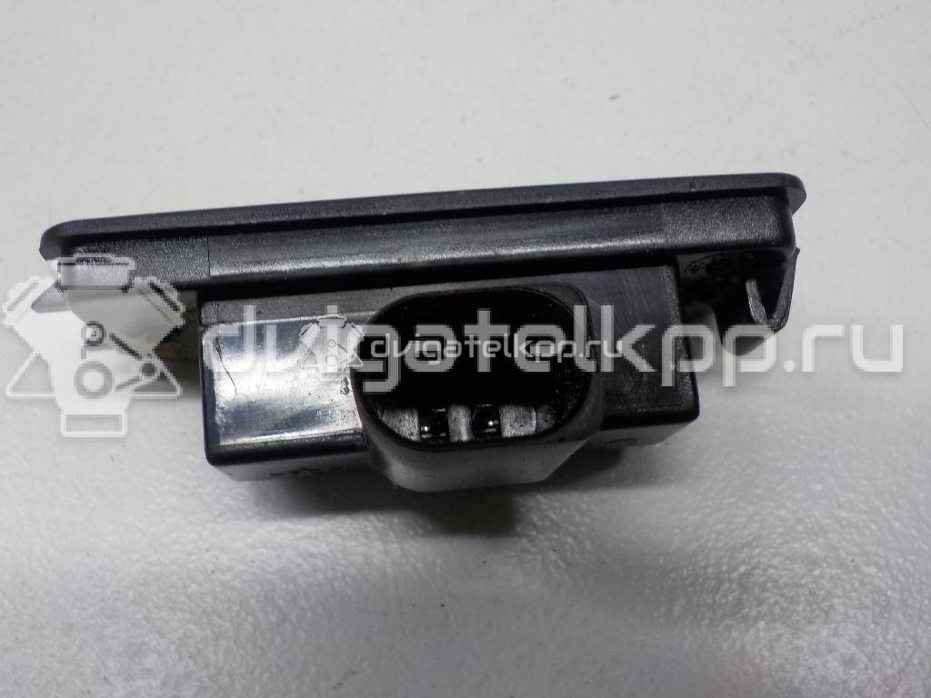 Фото Фонарь подсветки номера  1J6943021B для Volkswagen Scirocco / Touran / Amarok S1B / New Beetle / Bora {forloop.counter}}