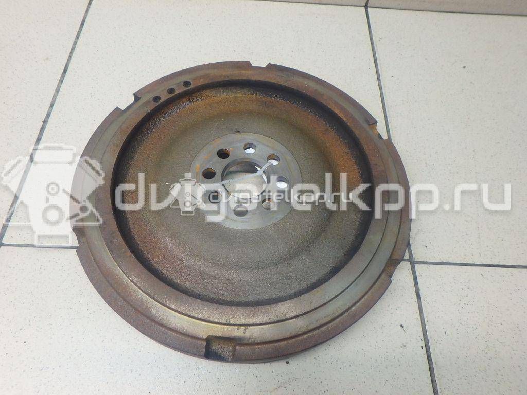 Фото Маховик для двигателя 1NR-FE для Daihatsu / Toyota 95-99 л.с 16V 1.3 л бензин 1340547020 {forloop.counter}}