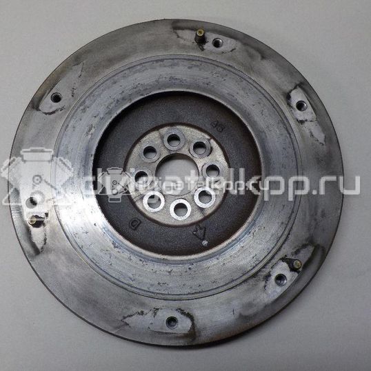 Фото Маховик для двигателя 1NR-FE для Daihatsu / Toyota 95-99 л.с 16V 1.3 л бензин 1340547020