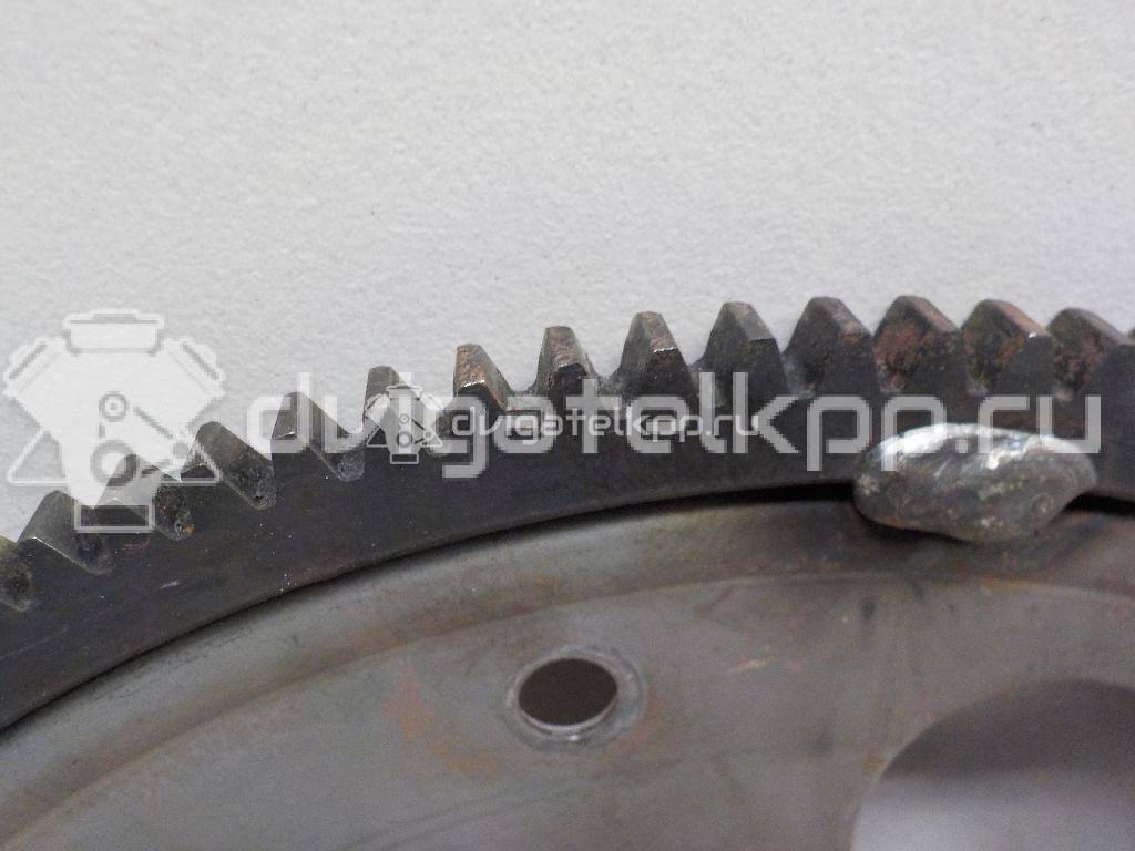 Фото Маховик для двигателя 2AZ-FE для Toyota / Daihatsu / Scion / Toyota (Faw) / Toyota (Gac) 152-163 л.с 16V 2.4 л бензин 3210106030 {forloop.counter}}