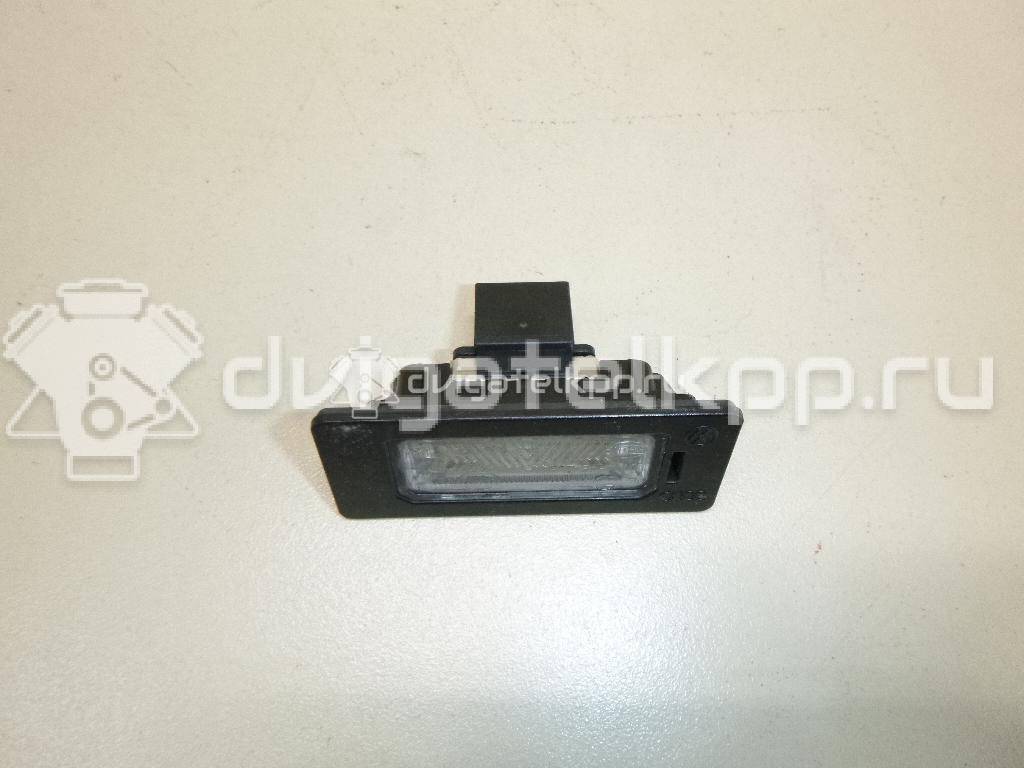 Фото Фонарь подсветки номера  8T0943021 для vw Passat [B6] {forloop.counter}}