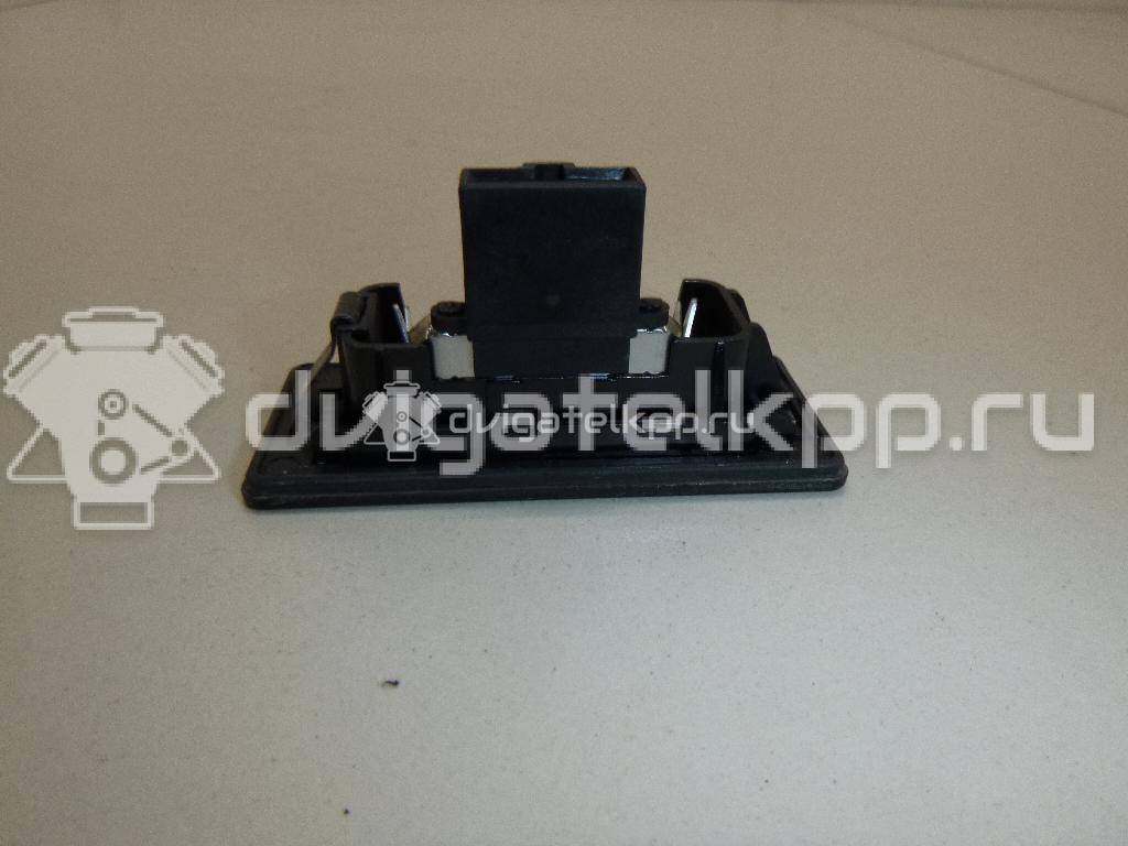 Фото Фонарь подсветки номера  8T0943021 для vw Passat [B6] {forloop.counter}}