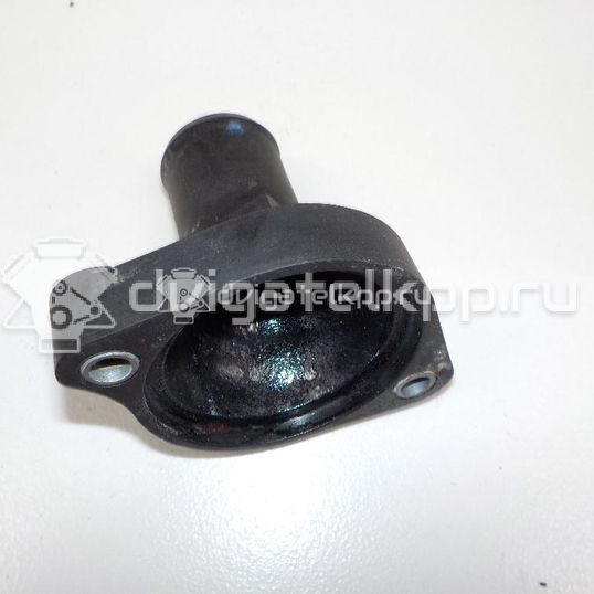 Фото Крышка термостата для двигателя 1KR-FE для Subaru / Citroen / Toyota / Daihatsu 68-69 л.с 12V 1.0 л бензин 163210Q010