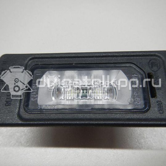 Фото Фонарь подсветки номера  4G0943021 для Audi A4 / A6 / A3 / A5 / Tt