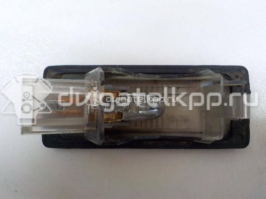 Фото Фонарь подсветки номера  8200013577 для Renault Modus Grand F Jp0 / Megane / Clio / Laguna / Scénic {forloop.counter}}