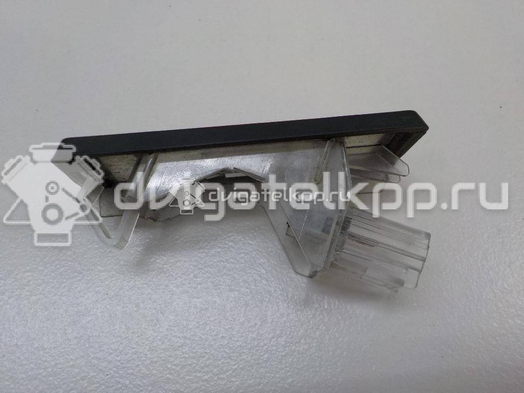 Фото Фонарь подсветки номера  8200013577 для Renault Modus Grand F Jp0 / Megane / Clio / Laguna / Scénic {forloop.counter}}