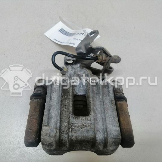 Фото Суппорт тормозной задний левый  1K0615423J для Skoda Roomster 5J / Octaviaii 1Z3 / Yeti 5L / Fabia / Octavia