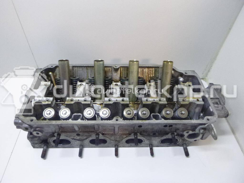 Фото Головка блока для двигателя 4G92 (DOHC 16V) для Mitsubishi Mirage 147-174 л.с 16V 1.6 л бензин MD313416 {forloop.counter}}