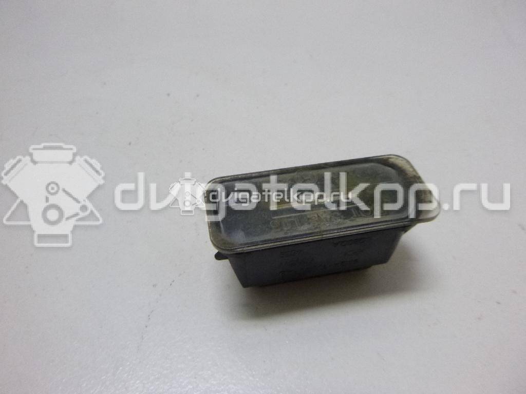 Фото Фонарь подсветки номера  5105886 для Ford Fiesta / Focus / Tourneo / C-Max / Ka {forloop.counter}}