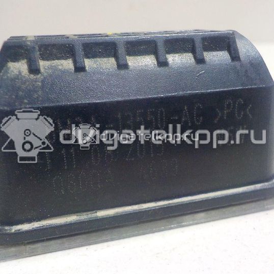 Фото Фонарь подсветки номера  5105886 для Ford Fiesta / Focus / Tourneo / C-Max / Ka