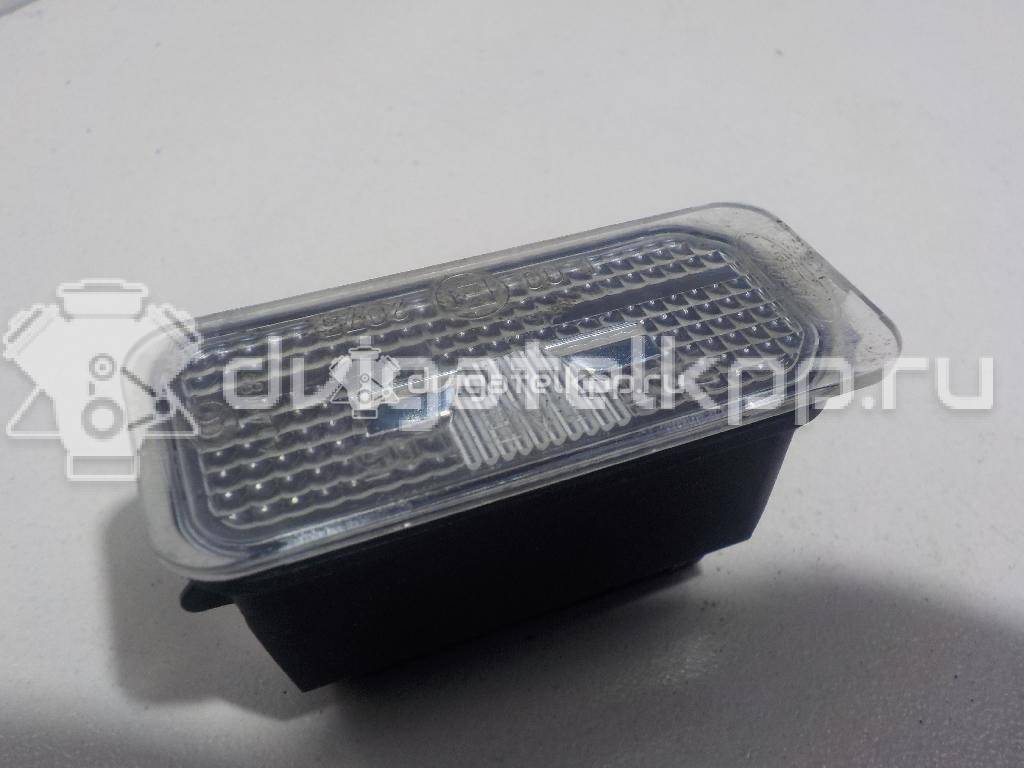 Фото Фонарь подсветки номера  5105886 для Ford Fiesta / Focus / Tourneo / C-Max / Ka {forloop.counter}}