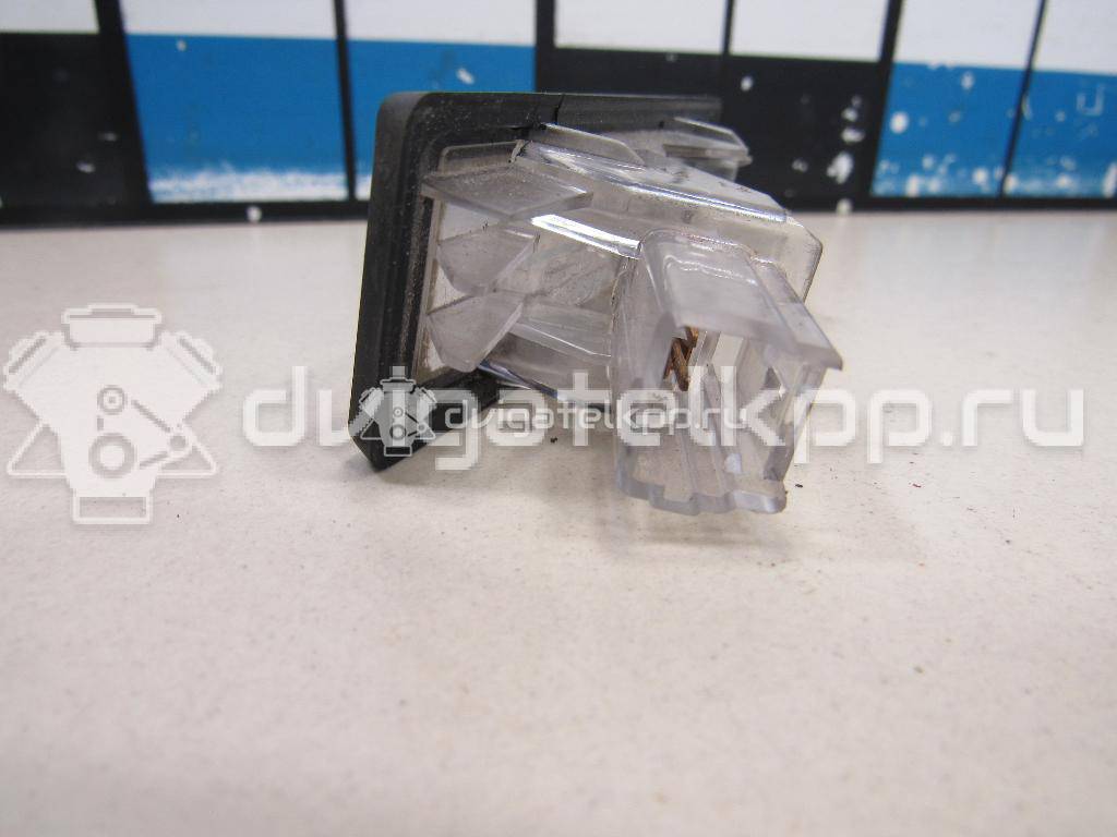 Фото Фонарь подсветки номера  8200013577 для Renault Modus Grand F Jp0 / Megane / Clio / Laguna / Scénic {forloop.counter}}