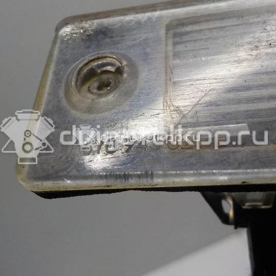 Фото Фонарь подсветки номера  6Y0943021E для Skoda Fabia / Yeti 5L