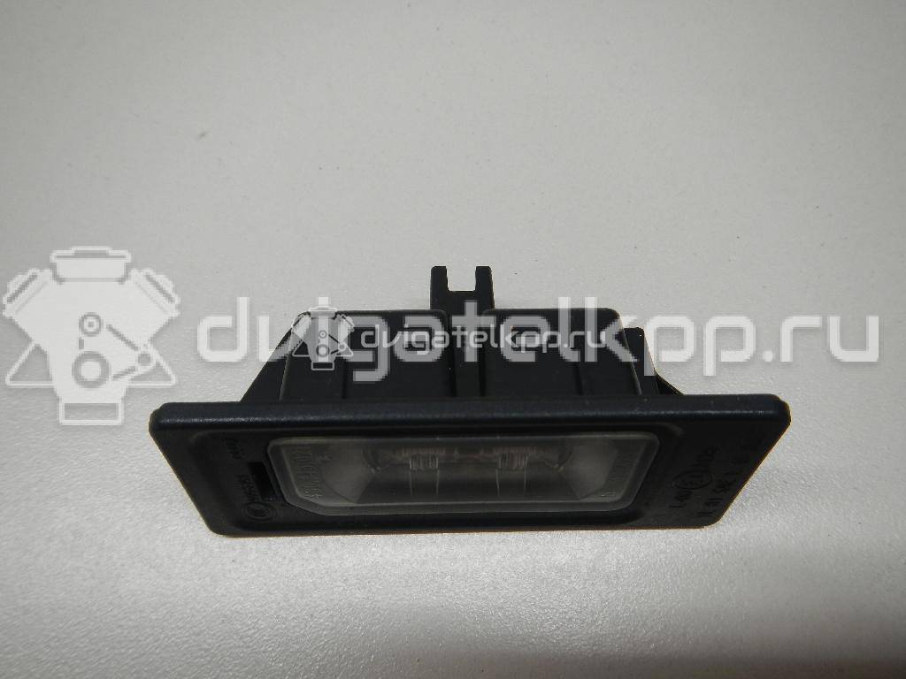 Фото Фонарь подсветки номера  4G0943021 для Audi A4 / A6 / A3 / A5 / Tt {forloop.counter}}