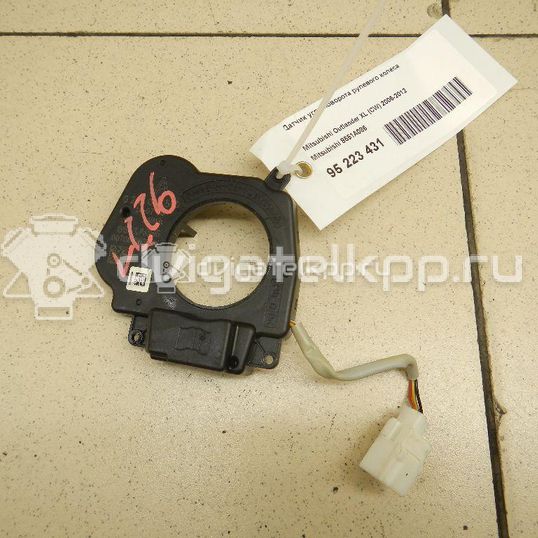 Фото Датчик угла поворота рулевого колеса  8651A086 для Mitsubishi Lancer / Outlander