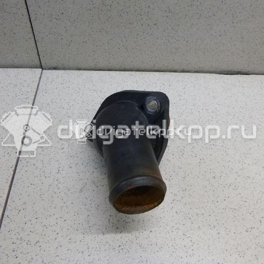 Фото Крышка термостата  1148329 для Ford Fiesta / Focus / Tourneo / Sierra / C-Max