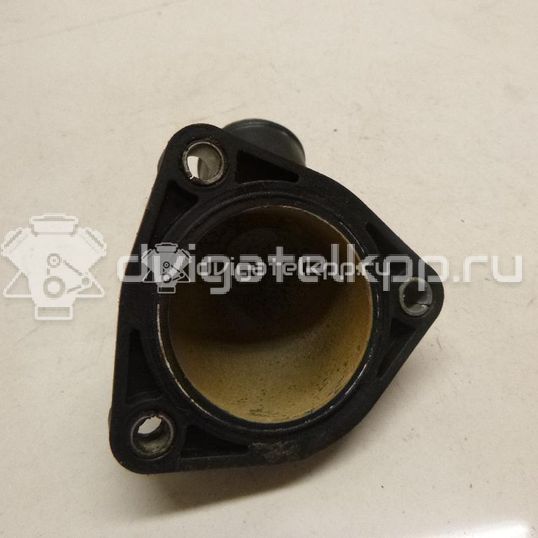 Фото Крышка термостата  1148329 для Ford Fiesta / Focus / Tourneo / Sierra / C-Max