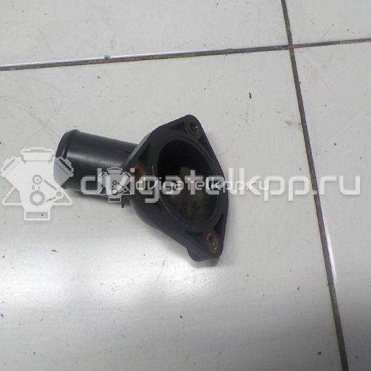 Фото Крышка термостата  1148329 для Ford Fiesta / Focus / Tourneo / Sierra / C-Max