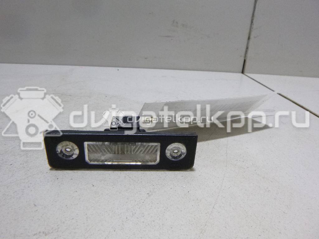 Фото Фонарь подсветки номера  1Z0943021B для Skoda Roomster 5J / Octavia / Octaviaii 1Z3 {forloop.counter}}