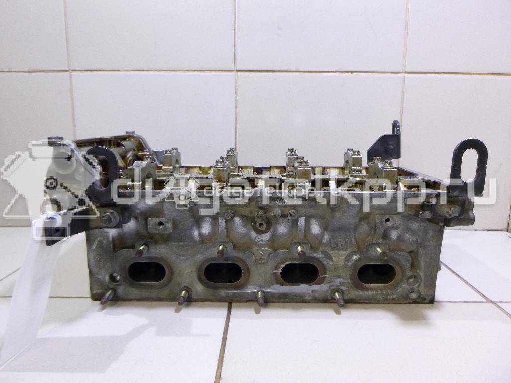 Фото Головка блока для двигателя A 16 XER для Opel / Vauxhall 114-116 л.с 16V 1.6 л бензин 55570930 {forloop.counter}}