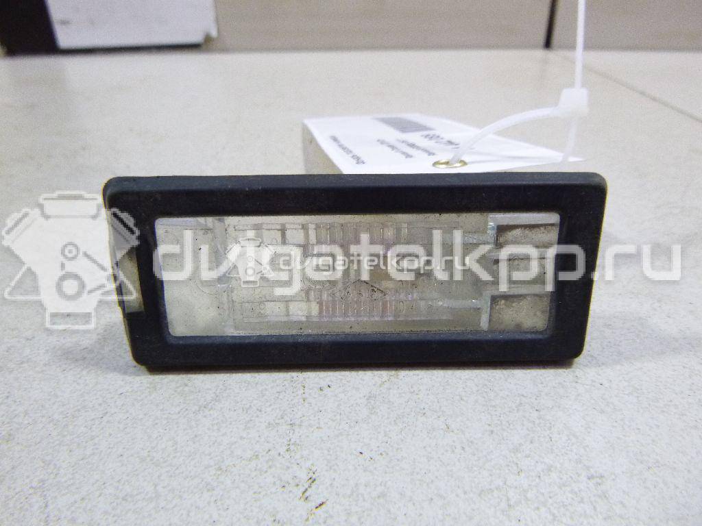 Фото Фонарь подсветки номера  8200013577 для Renault Modus Grand F Jp0 / Megane / Clio / Laguna / Scénic {forloop.counter}}