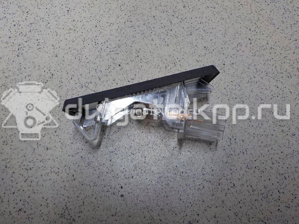 Фото Фонарь подсветки номера  8200013577 для Renault Modus Grand F Jp0 / Megane / Clio / Laguna / Scénic {forloop.counter}}