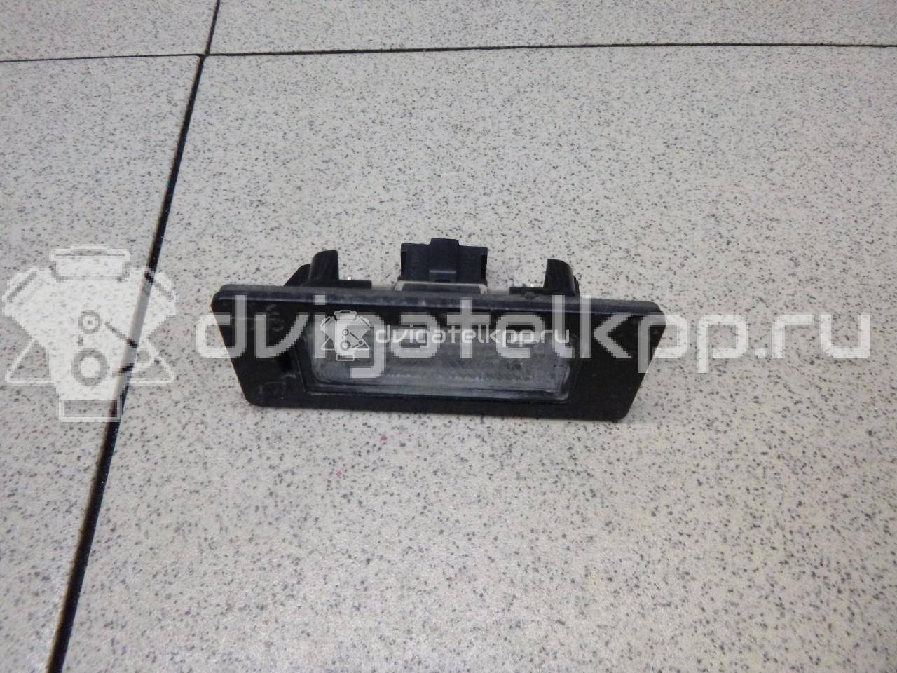 Фото Фонарь подсветки номера  8T0943021 для vw Passat [B6] {forloop.counter}}